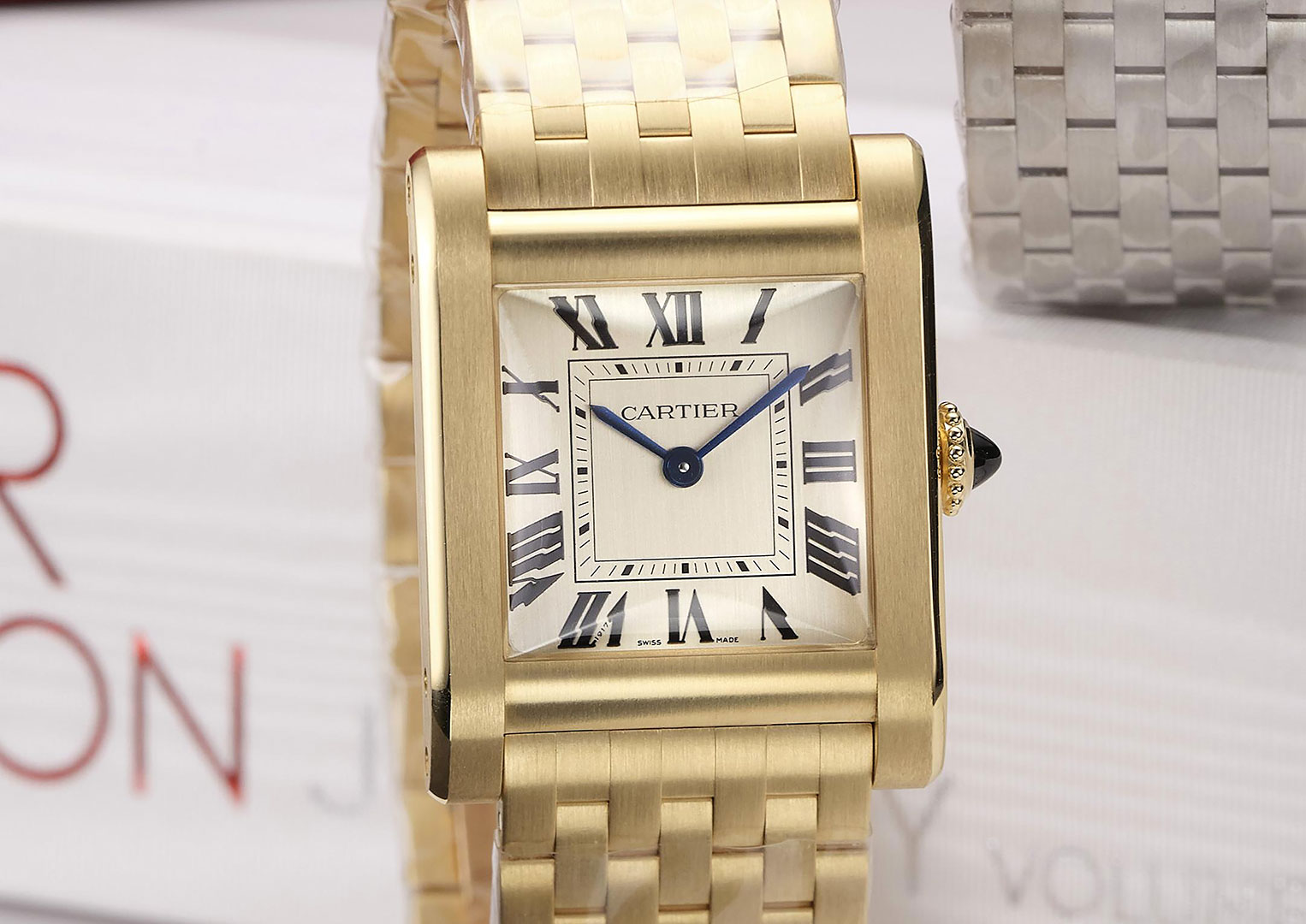 The gold Cartier Tank model worn by Susie Glass. Image: Courtesy of Bonhams